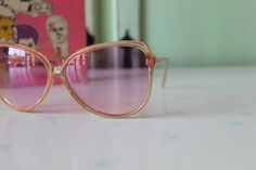 "NOS- new old stock made in taiwan 1970s-1980s lovely tinted lens non prescription lens dreamy retro shades!! amazing style 6\"total width 2 1/2\"lens width 5 1/2\"arms length Thank YOU and please feel free to ask me any ?s:) Have a lovely day xoxo www.etsy.com/shop/retroandme #LOLLIPOP" Retro Plastic Festival Sunglasses, Vintage Pink Sunglasses For Party, Vintage Pink Glass Sunglasses, Vintage Plastic Sunglasses With Tinted Lenses, Vintage Sunglasses With Tinted Plastic Lenses, Vintage Sunglasses With Gradient Lenses, Vintage Pink Sunglasses With Uv Protection, Vintage Pink Sunglasses With Mirrored Lenses, Hipster Costume