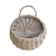 an empty wicker basket with handles on a white background, isolated for use as a decoration