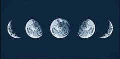 three phases of the moon are shown in black and white, as well as blue background