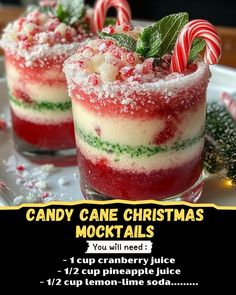 two glasses filled with candy cane christmas cocktails