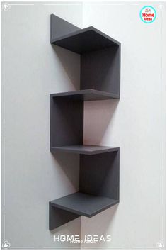 three black shelves on the wall with white walls in the background and text home ideas