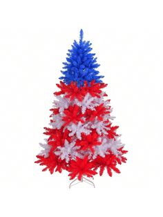 a red, white and blue christmas tree on a stand