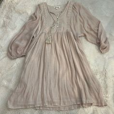 New Without Tags, Never Been Worn. Size Small But Runs Big Bohemian Beige Mini Dress For Day Out, Beige Flowy Boho Dress Casual Style, Casual Flowy Beige Boho Dress, Casual Beige Flowy Boho Dress, Brown Cottagecore Dress For Summer, Beige Boho Dress With Lace Trim For The Beach, Beige Boho Dress For Fall Vacation, Beige Flowy Cotton Dress, Flowy Beige Boho Dress For Brunch