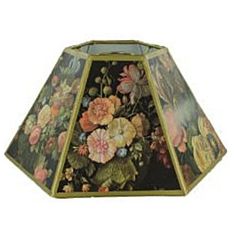 a lamp shade with flowers painted on it