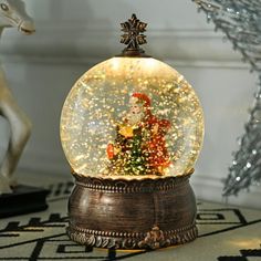 a snow globe sitting on top of a table