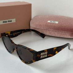 Brand New Miu Miu Mu03zs Vau06b Sunglasses In Honey Havana. Featuring A Brown Havana Acetate Frame With Dark Brown Lenses. Gold Miu Miu Detailing On Temples. Size 54-17-140. Adjustable Nose Pads! 100% Authentic And Unworn. Made In Italy. Box, Case, Cloth And Paperwork Included. Retail Price $439. Miu Miu Sunglasses Cat Eye, Havana Brown Cat, Brown Cat Eye, Miu Miu Sunglasses, Brown Cat, Havana Brown, Colored Sunglasses, Brown Gold, Havana