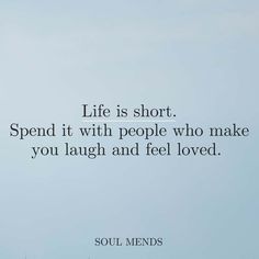 an airplane flying in the sky with a quote about life is short spend it with people who make you laugh and feel loved