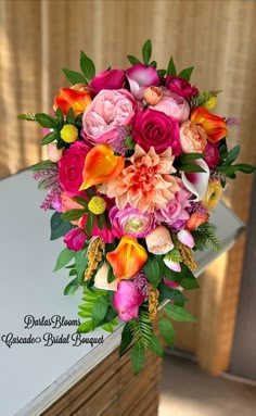 a bouquet of flowers sitting on top of a table