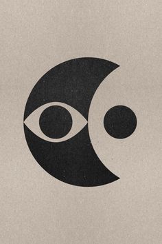 an image of a black and white logo with two circles in the shape of eyes