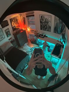 a person taking a selfie in a mirror