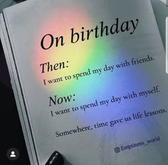 an open book with the words on birthday written in it next to a black pen