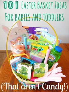 a basket filled with lots of toys on top of a wooden table