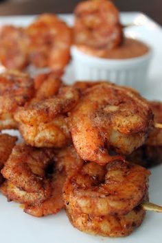 some fried food is on a white plate