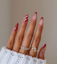 27 Candy Cane Nails That Are Oh So Sweet - Lifestyle With Amal Christmas Nail Design Almond Shape, Christmas Nail Sets Almond, Christmas Acrylics Almond, Builder Gel Christmas Nails, Christmas Nail Inspo 2024, Funky Christmas Nails Acrylic, Almond Nail Christmas Designs, Christmas Red And Gold Nails, Almond Shape Nails Christmas