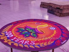 a colorful table with the words 100 years on it