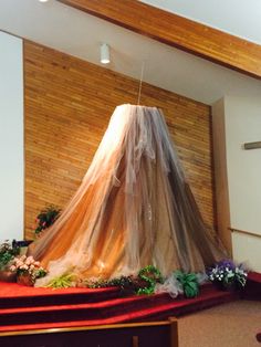 a church alter with a veil on top of it