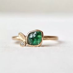 *Ethically Sourced raw Emerald, crafted with care and conscience for the conscious wearer. Each piece is handcrafted with Solid 14k/18k gold / platinum / silver in your choice. Specification: Item Type: Raw Gemstone Ring Materials: Raw Stone, Silver, Gold Main Stone: Raw Emerald Gem Color: Green *This is a listing for one handcrafted Emerald ring. We will carefully select a stone and make the piece for you. Please note that no two pieces are the same. Every raw stone is unique in size, shape and Raw Stone Engagement Rings Silver, Raw Emerald Engagement Ring, Unique Stone Engagement Rings, Green Stone Engagement Ring, Green Emerald Engagement Ring, Raw Stone Engagement Rings, Emerald Engagement Ring Green, Emerald Engagement Rings, Raw Emerald