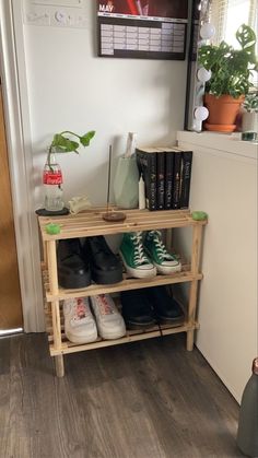 there is a shelf with shoes on it