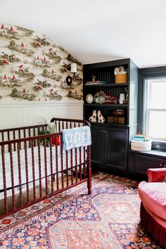 a baby's crib in the corner of a room