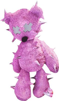 a pink stuffed animal with spikes on it's head