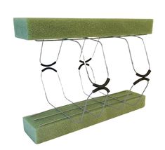 a green bench with three hooks attached to it