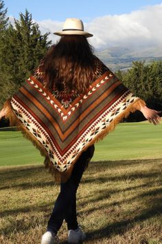 These alpaca ponchos come from the Andes mountains in Ecuador where the locals have been using the ponchos for years to keep warm. The ponchos are made and finished by hand, so each poncho is unique! Large wool poncho made of alpaca wool in Ecuador. Experience freedom of movement and soft material The ponchos are made of 50% alpaca wool & 50% acrylic. This blend of raw materials ensures that the material is strong, warm and soft! This keeps the ponchos beautiful for a long time. Weight poncho 10 Cheap Multicolor Bohemian Poncho, Poncho Outfits For Women, Cowboy Poncho, Fair Clothes, Military Poncho, Style In 2023, Poncho Fashion, The Andes Mountains, Poncho Outfit