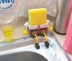 a sink that has some kind of toy in it