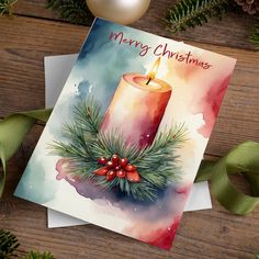 a watercolor christmas card with a candle on it