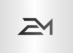 the letter m is made up of black and white letters on a light gray background