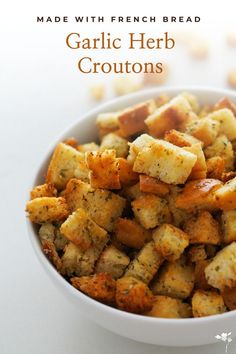 A bowl full of croutons, with some arranged on a white quartz counter behind it. How To Make Croutons, Homemade French Bread, Crouton Recipes, Wheat Bread Recipe, White Bread Recipe, Dry Bread, Herb Bread, Favorite Salad