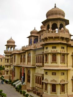 an old building with many windows and balconies