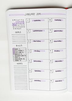 an open planner book on a table with the dates and times listed in each section