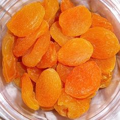 peeled oranges in a bowl on a table