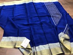 🌹PURE MYSORE SILK WRINKELED CREPE SILK SAREES. CONTRAST BLOUSE Mysore silk sarees have a sheen and luster not found in other silk saree types. An interesting fact about these sarees is that these are exclusively manufactured as opposed to other artificial silk fabric produced on a large scale. . #dfeminineshoppeestore DM for orders!!!!!!!. Dr Neeta sharma -8827366281 Blouse For Mysore Silk Saree, Pure Mysore Silk Saree, Royal Blue Mysore Silk Saree, Blue Tussar Silk Pre-draped Saree For Puja