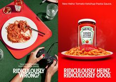 a person holding a game controller next to a plate of food and a jar of tomato sauce