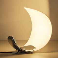 a lamp that is shaped like the moon