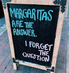 a sign that says margaritas are the answer, i forget the question on it