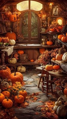 a room filled with lots of pumpkins and other decorations