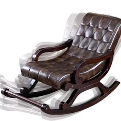 a wooden rocking chair with leather upholstered seat