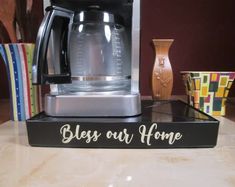 a coffee maker sitting on top of a counter