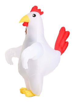 an inflatable chicken is standing on its hind legs