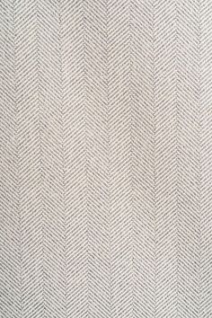 an upholstered white and grey herringbone fabric