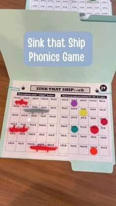 a pink and blue sign that says sink that ship phonics game on it