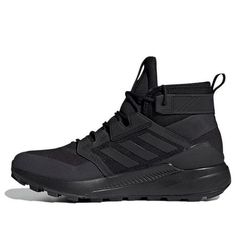 The Pharrell x adidas Terrex Trailmaker Mid GTX 'Triple Black' is a versatile and comfortable hiking shoe that is perfect for any outdoor activity. The shoe features a breathable textile knit upper with an EVA stability frame and waterproof Gore-Tex lining. The lightweight EVA midsole provides support and cushioning, while the off-road Traxion outsole provides grip and traction on any surface. (SNKR/Unisex/High Top/Crossover) Hiking Shoe, Adidas Terrex, Adidas X, Pharrell Williams, Triple Black, Outdoor Activity, Hiking Shoes, Gore Tex, Off Road