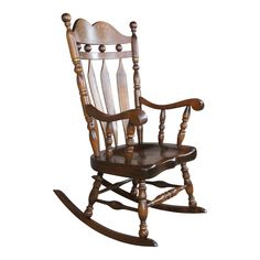 a wooden rocking chair with wood trimmings on the back and arms, against a white background