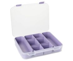 an open plastic container filled with lots of compartments