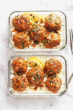 two trays filled with meatballs and rice on top of a table next to a fork