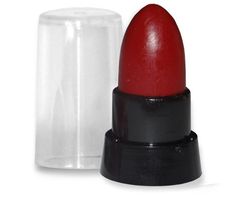 a red lipstick sitting next to a clear container