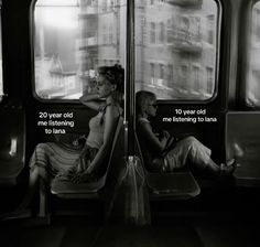 two women sitting on a train looking out the window with their backs to each other