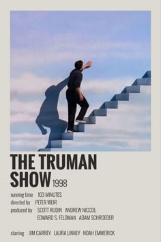 the truman show poster showing a man walking up stairs with his hand on his hip